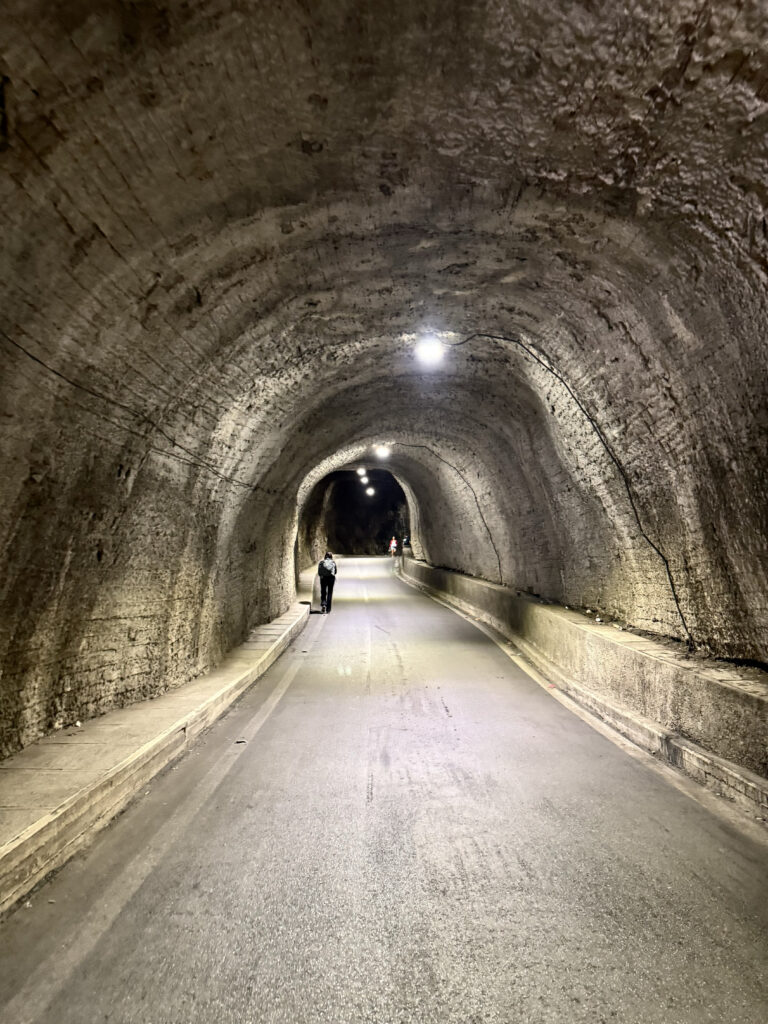 ChrisxBianca, Chris & Bianca, Albania, Komani Lake, walking through the tunnel